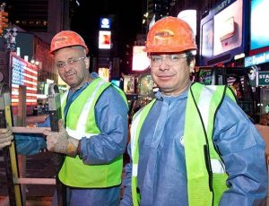 Two Danella Employees Working an Utility Construction Site in Times Square, New York City