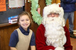 LaSalle - Christmas - Santa and a happy third grader