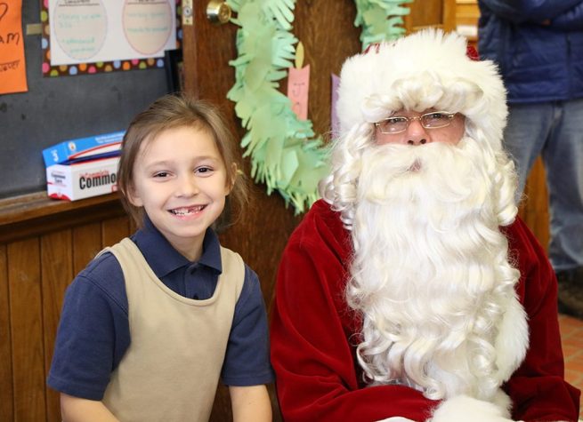 LaSalle - Christmas - Santa and a happy third grader