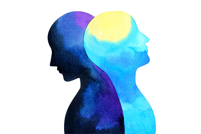 Watercolor illustration of two silhouettes back to back.