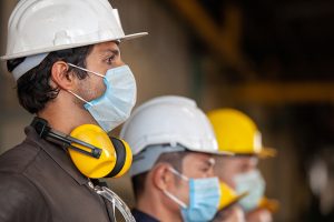 Construction workers in masks